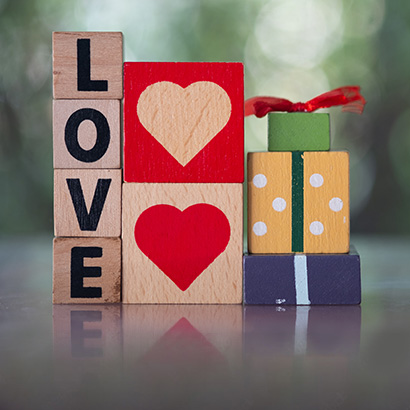 painted cubes spelling out the word LOVE